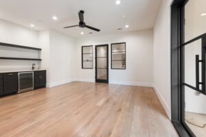 Contemporary Flex Room with Wet Bar and Glass Double Doors