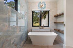 Freestanding Tub with Natural Light and Shelving