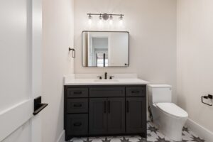 Guest Bath with Bold Tile and Black Accents