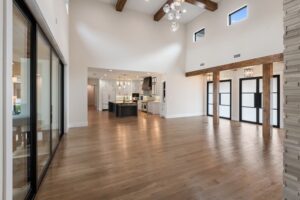 Open Concept Living Room with Vaulted Ceiling & Kitchen View